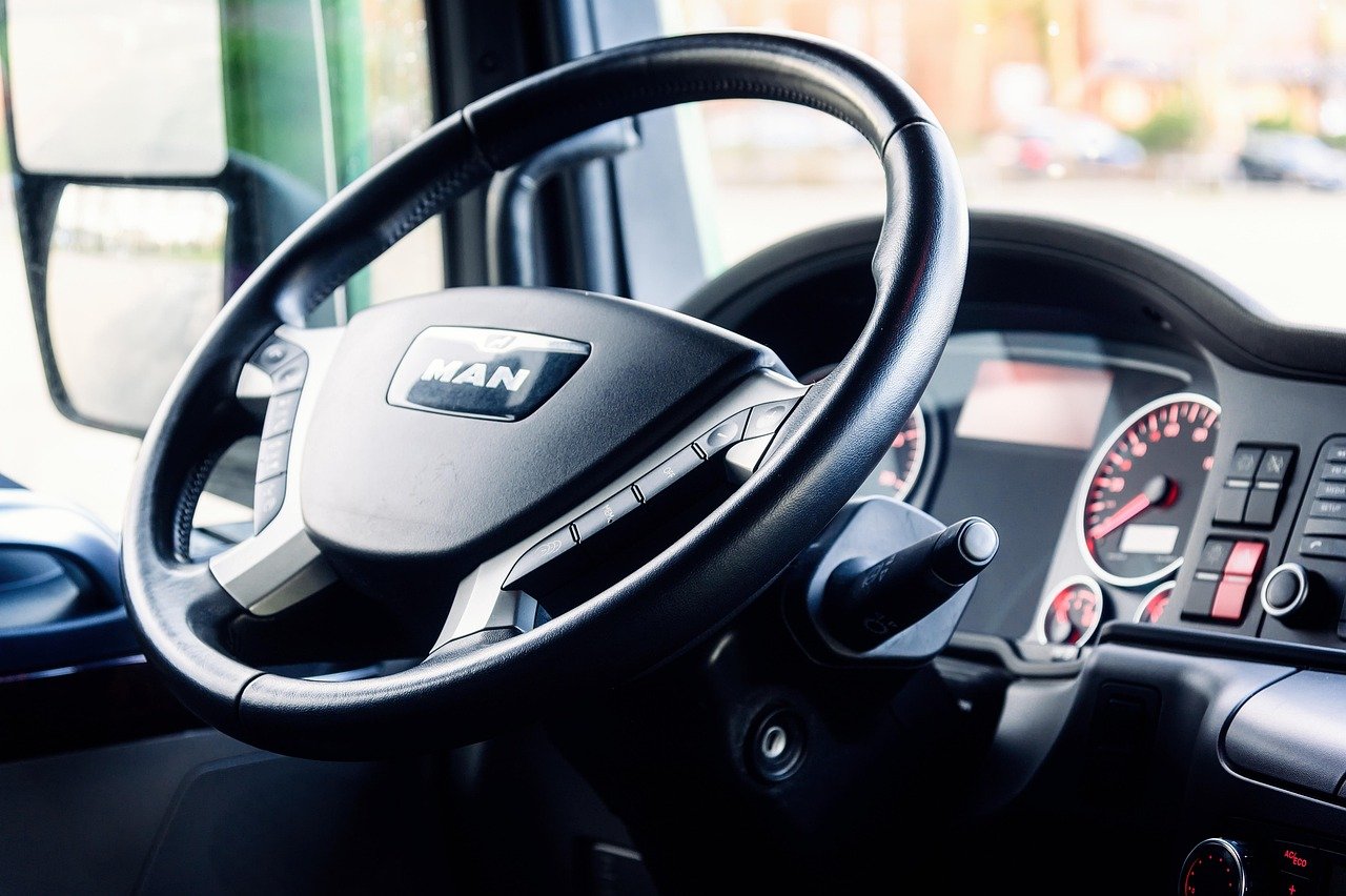 Truck cockpit dashboard showing fleet telematics data