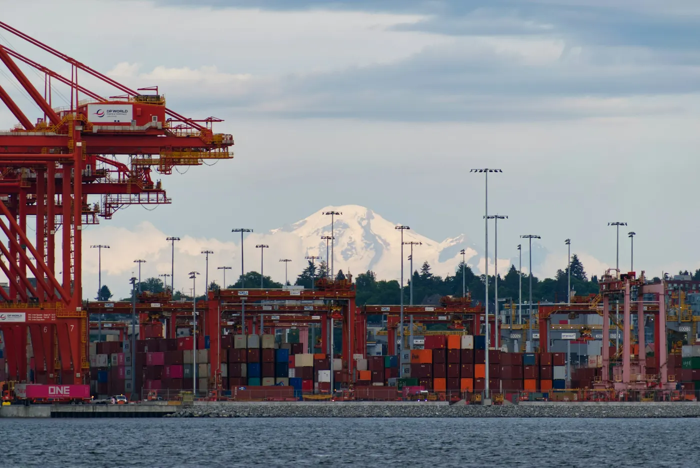 Container terminal at the Port of Vancouver with Mount Baker in the distance