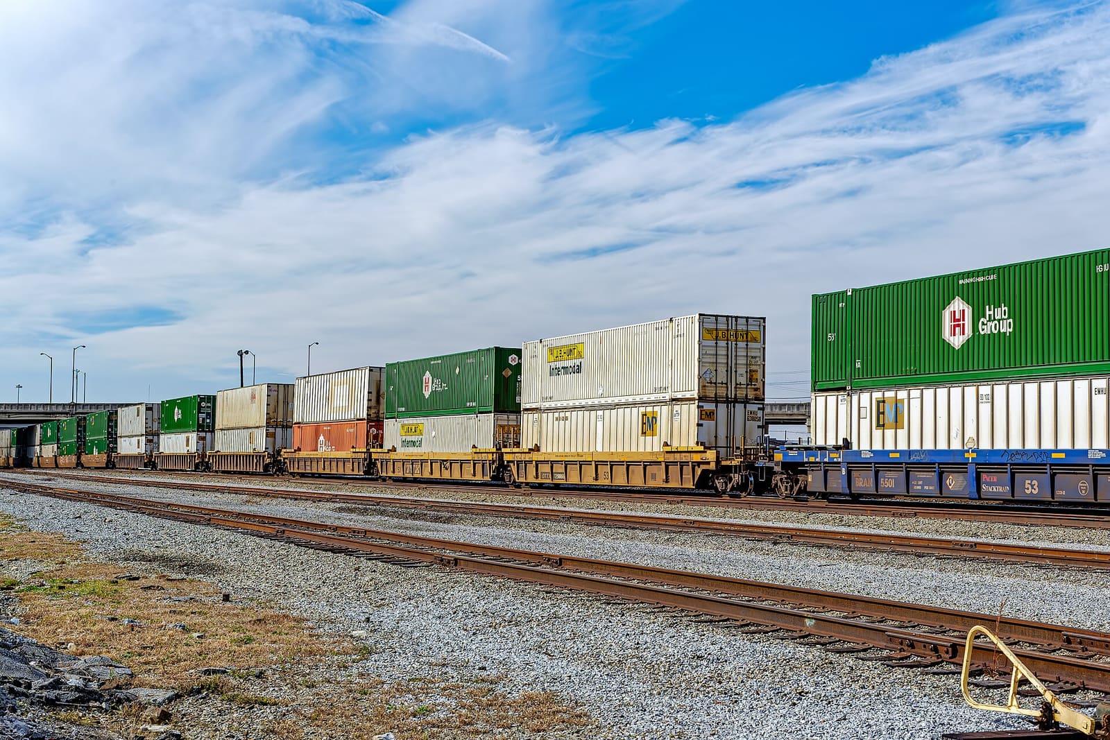 Intermodal freight containers on rail flat cars